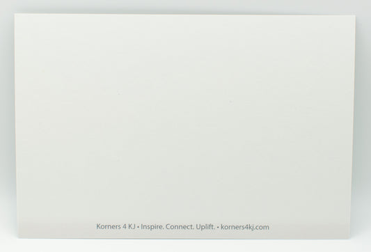 White card with text 'Korners 4 KJ' and website URL on a white background