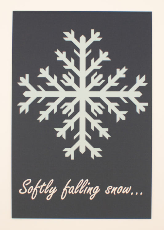 White snowflake on a dark gray background with text 'Softly falling snow...'.