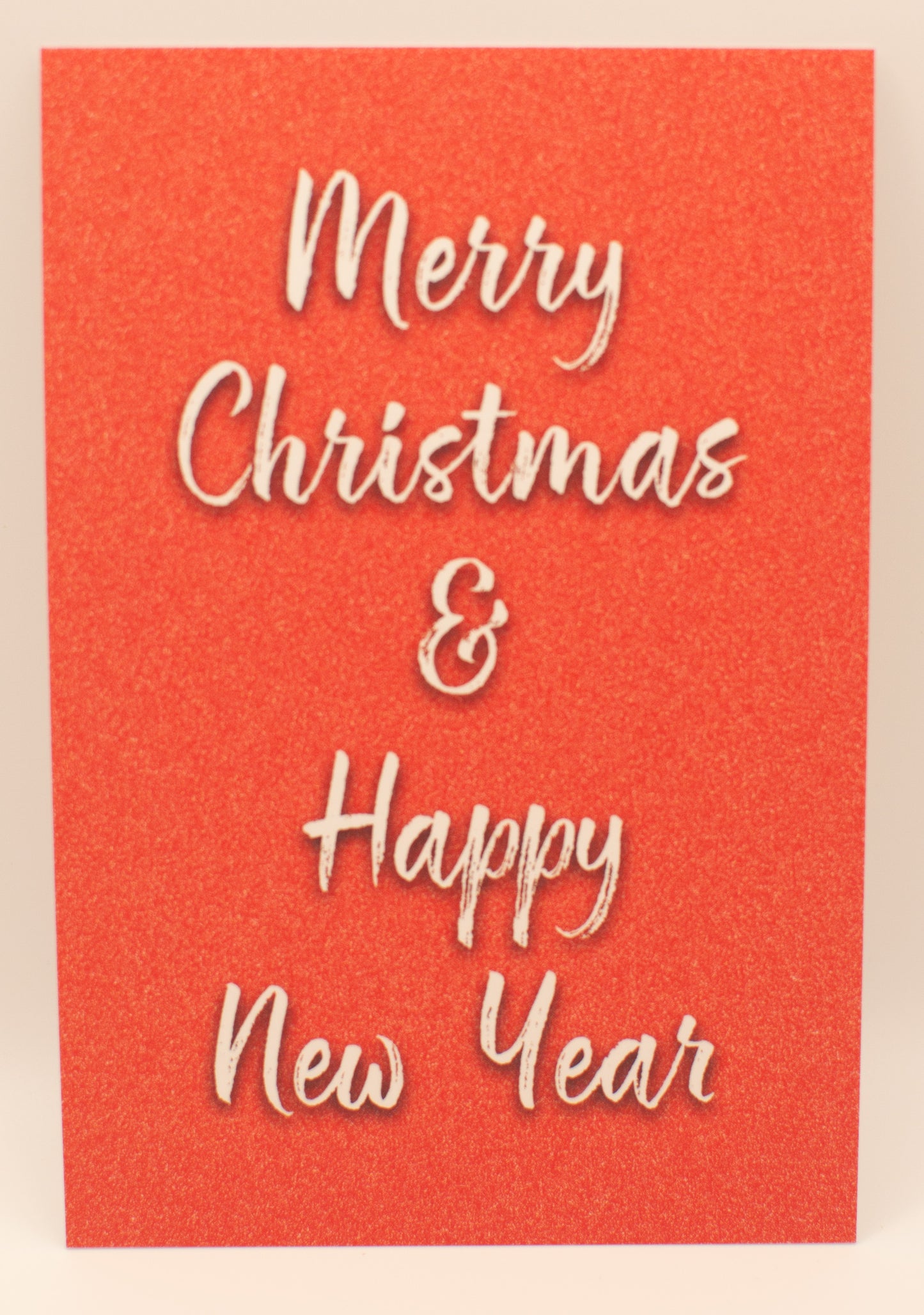 Red card with 'Merry Christmas & Happy New Year' text