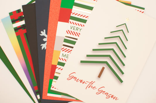 Set of colorful greeting cards with geometric designs and text on a white background