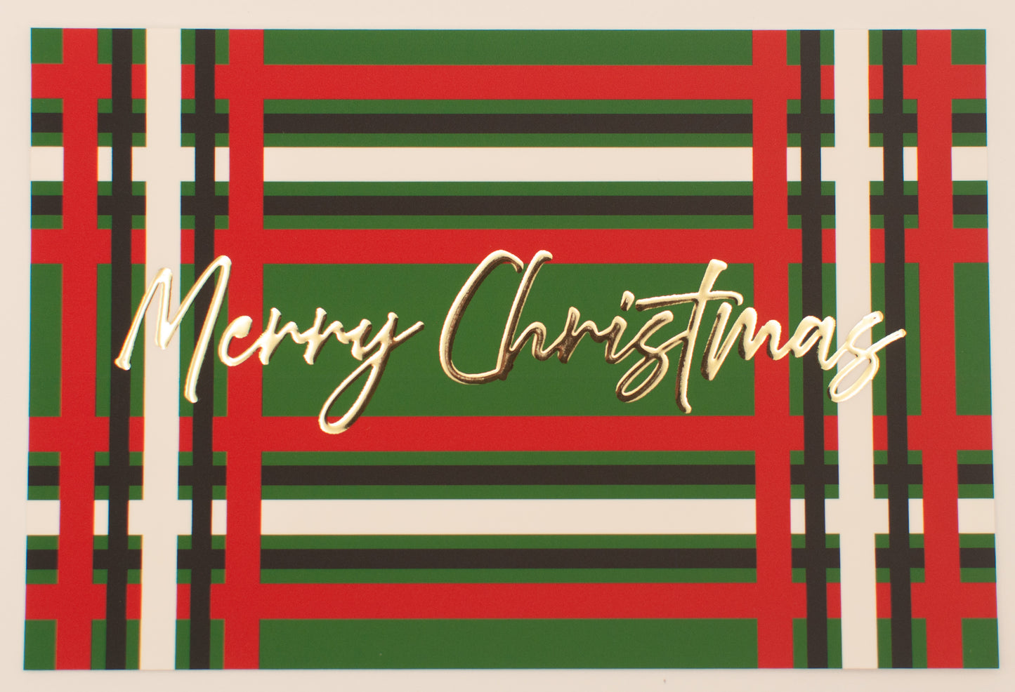 Merry Christmas text on a plaid pattern with red, green, and white colors.